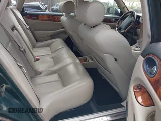 2003 Jaguar XJ with VIN SAJDA15B53MF53212, listed as a IAAI auction lot 41613266 with 180,165 mi miles and . Bid and sale history available at DreamBid. Image 8.