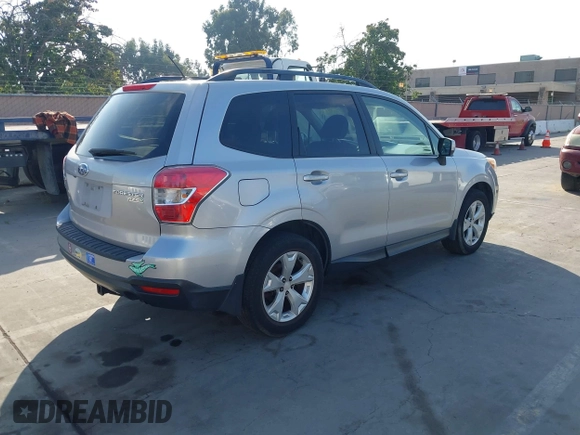 2014 Subaru Forester Premium with VIN JF2SJAEC5EH551632, listed as a IAAI auction lot 42640444 with 240,591 mi miles and . Bid and sale history available at DreamBid. Image 4.