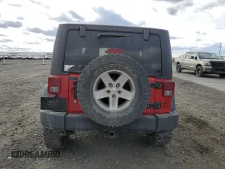 2012 Jeep Wrangler Rubicon with VIN 1C4BJWCG8CL202637, listed as a Copart auction lot 49145935 with 113,520 mi miles and Salvage Title. Bid and sale history available at DreamBid. Image 6.
