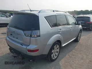 2009 Mitsubishi Outlander SE with VIN JA4LT31W09Z014816, listed as a IAAI auction lot 42399219 with 188,136 mi miles and . Bid and sale history available at DreamBid. Image 4.