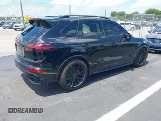 2016 Porsche Cayenne GTS z VIN WP1AD2A25GLA70430, wystawiony jako IAAI lot #42547008 z przebiegiem 108 374 mil mil oraz . Historia ofert i sprzedaży dostępna na DreamBid. Obrazek 4.