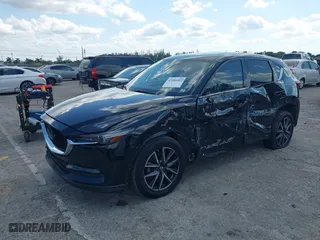 2018 Mazda CX-5 Grand Touring with VIN JM3KFBDM2J0390611, listed as a IAAI auction lot 42006482 with 97,497 mi miles. Bid and sale history available at carsss.com. Image 17.