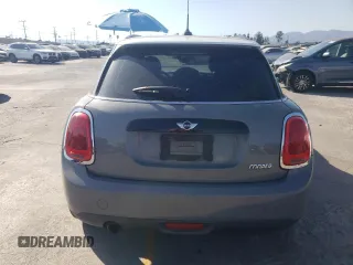 2016 MINI Hardtop 4 Door with VIN WMWXU1C59G2D11117, listed as a Copart auction lot 65191715 with 121,633 mi miles and Salvage title. Bid and sale history available at DreamBid. Image 6.