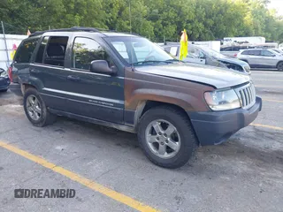 2004 Jeep Grand Cherokee Laredo z VIN 1J4GW48S64C154625, wystawiony jako IAAI lot #42635330 z przebiegiem 268 183 mil mil oraz . Historia ofert i sprzedaży dostępna na DreamBid. Obrazek 1.