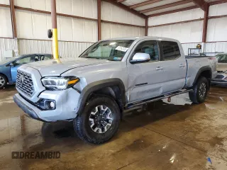 2020 Toyota Tacoma SR5 with VIN 3TMDZ5BN0LM091107, listed as a Copart auction lot 57582235 with 39,331 mi miles and Salvage title. Bid and sale history available at DreamBid. Image 1.
