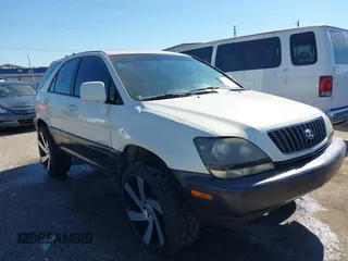 1999 Lexus RX 300 Luxury SUV with VIN JT6HF10U1X0086852, listed as a IAAI auction lot 41383711 with 284,047 mi miles. Bid and sale history available at carsss.com. Image 1.