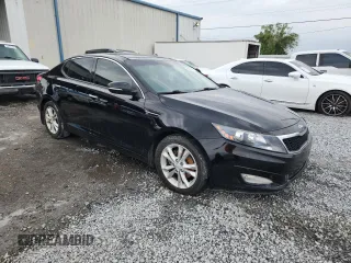 2013 Kia Optima EX z VIN 5XXGN4A79DG162815, wystawiony jako Copart lot #59282275 z przebiegiem 163 920 mil mil oraz Szkoda całkowita • Salvage title. Historia ofert i sprzedaży dostępna na DreamBid. Obrazek 4.