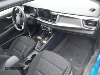 2022 Kia Rio S with VIN 3KPA24AD0NE458613, listed as a IAAI auction lot 41646100 with 106,859 mi miles and . Bid and sale history available at carsss.com. Image 5.