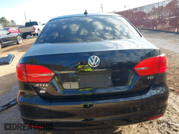 2012 Volkswagen Jetta TDI w/Premium with VIN 3VWLL7AJ2CM426050, listed as a IAAI auction lot 41332817 with 111,996 mi miles and . Bid and sale history available at DreamBid. Image 16.