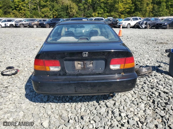 1997 Honda Civic DX with VIN 1HGEJ6228VL123265, listed as a Copart auction lot 74078684 with 49,904 mi miles and Salvage Title. Bid and sale history available at carsss.com. Image 6.