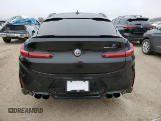 2022 BMW X4 M z VIN 5YM23EC00N9M68670, wystawiony jako Copart lot #80404663 z przebiegiem 5979 mil mil oraz . Historia ofert i sprzedaży dostępna na DreamBid. Obrazek 6.