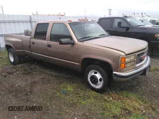 1996 GMC Sierra 1500 with VIN 1GTHC33J4TF010466, listed as a Copart auction lot 48392195 with 143,267 mi miles and Salvage Title. Bid and sale history available at DreamBid. Image 4.