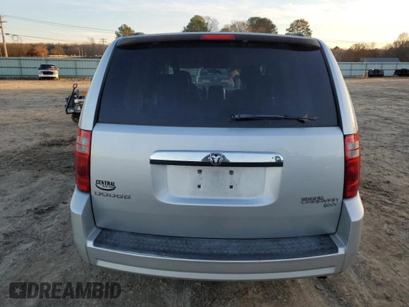 2010 Dodge Grand Caravan SXT with VIN 2D4RN5D16AR496795, listed as a Copart auction lot 83374834 with 99,902 mi miles and Salvage Title. Bid and sale history available at DreamBid. Image 6.