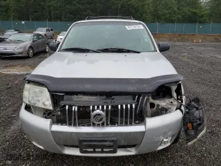 2006 Mercury Mariner Luxury with VIN 4M2YU561X6KJ15149, listed as a Copart auction lot 87218134 with 235,328 mi miles and Salvage Title. Bid and sale history available at carsss.com. Image 5.