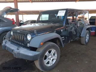 2018 Jeep Wrangler JK Unlimited Sport S with VIN 1C4BJWDG4JL883990, listed as a IAAI auction lot 41677364 with 112,389 mi miles. Bid and sale history available at carsss.com. Image 17.