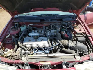 1995 Ford Escort z VIN 3FASP13JXSR178859, wystawiony jako Copart lot #63077024 z przebiegiem 158 363 mil mil oraz Czysty tytuł • Clean title. Historia ofert i sprzedaży dostępna na DreamBid. Obrazek 11.