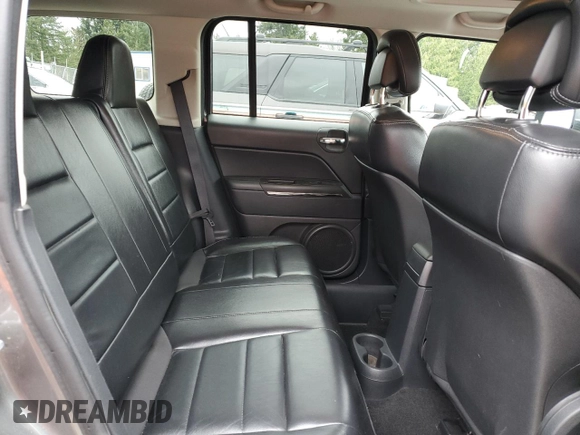 2011 Jeep Patriot Latitude X with VIN 1J4NF4GBXBD279868, listed as a Copart auction lot 49919315 with 94,725 mi miles and Salvage Title. Bid and sale history available at DreamBid. Image 11.