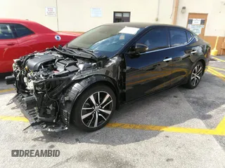 2021 Nissan Maxima SV with VIN 1N4AA6CV4MC506744, listed as a IAAI auction lot 42150465 with 70,056 mi miles and . Bid and sale history available at DreamBid. Image 2.