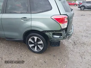 2018 Subaru Forester Premium with VIN JF2SJAEC5JH434174, listed as a IAAI auction lot 42106434 with 79,656 mi miles and . Bid and sale history available at DreamBid. Image 18.