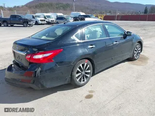 2016 Nissan Altima 2.5 SL with VIN 1N4AL3AP1GC112636, listed as a IAAI auction lot 41900211 with 106,361 mi miles. Bid and sale history available at carsss.com. Image 4.