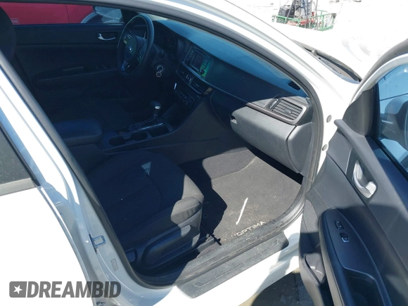 2016 Kia Optima LX with VIN KNAGT4L39G5073865, listed as a IAAI auction lot 41675211 with 120,751 mi miles. Bid and sale history available at carsss.com. Image 5.