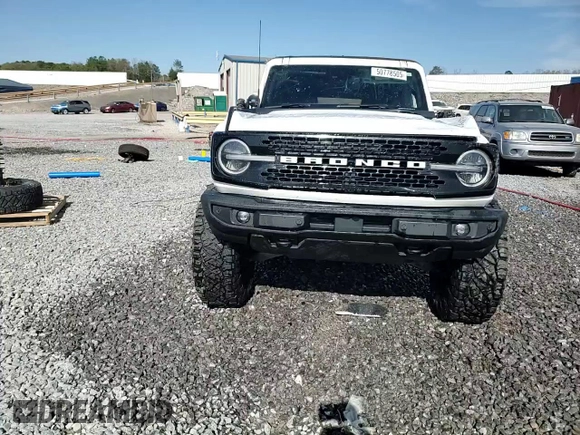 2022 Ford Bronco с VIN 1FMEE5DP6NLB41068, выставлен на аукционе Copart как лот 50778505 с пробегом 70 431 миль миль и Списание • Salvage title. История ставок и продаж доступна на DreamBid. Изображение 14.