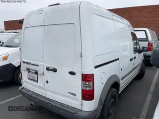 2012 Ford Transit Connect XL z VIN NM0LS7AN1CT083013, wystawiony jako IAAI lot #42007660 z przebiegiem 160 928 mil mil oraz . Historia ofert i sprzedaży dostępna na DreamBid. Obrazek 1.