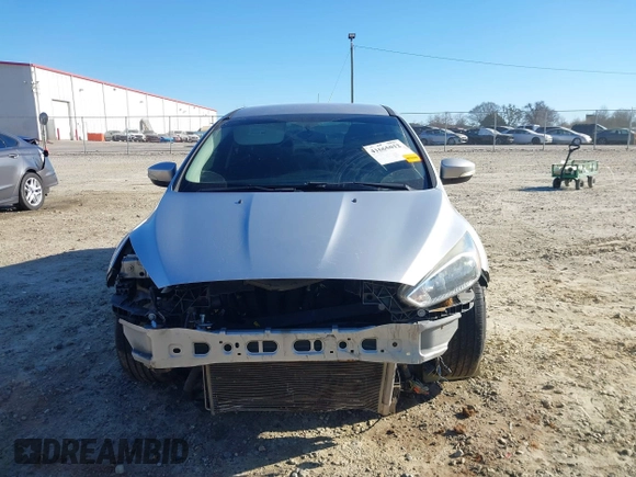 2016 Ford Focus SE with VIN 1FADP3F27GL390830, listed as a IAAI auction lot 41665012 with 119,673 mi miles. Bid and sale history available at carsss.com. Image 6.