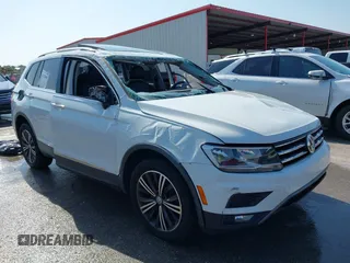 2018 Volkswagen Tiguan SEL with VIN 3VV3B7AX5JM091021, listed as a IAAI auction lot 42392698 with 107,595 mi miles and . Bid and sale history available at DreamBid. Image 1.