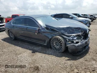 2016 BMW 7 Series 740i z VIN WBA7E2C57GG714564, wystawiony jako Copart lot #56186285 z przebiegiem 111 598 mil mil oraz Szkoda całkowita • Salvage title. Historia ofert i sprzedaży dostępna na DreamBid. Obrazek 4.