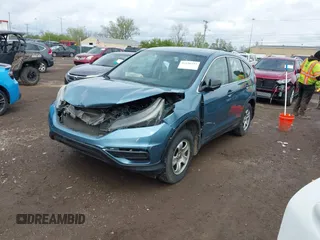 2015 Honda CR-V LX with VIN 2HKRM4H37FH601922, listed as a IAAI auction lot 42126743 with 165,764 mi miles and . Bid and sale history available at DreamBid. Image 2.