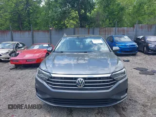 2019 Volkswagen Jetta S z VIN 3VWC57BUXKM121316, wystawiony jako IAAI lot #42290107 z przebiegiem 117 371 mil mil oraz . Historia ofert i sprzedaży dostępna na DreamBid. Obrazek 13.