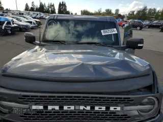 2023 Ford Bronco with VIN 1FMDE5CP1PLA92944, listed as a Copart auction lot 66625304 with 115,179 mi miles and Salvage title. Bid and sale history available at DreamBid. Image 13.