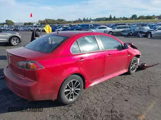2015 Mitsubishi Lancer SE with VIN JA32V2FW7FU024779, listed as a IAAI auction lot 40681839 with Not Provided miles. Bid and sale history available at carsss.com. Image 4.