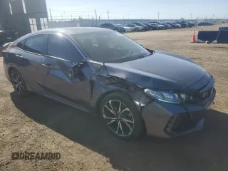 2018 Honda Civic Si with VIN 2HGFC1E57JH704397, listed as a Copart auction lot 51868535 with 44,620 mi miles and Salvage Title. Bid and sale history available at DreamBid. Image 4.