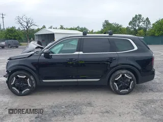2023 Kia Telluride EX with VIN 5XYP34GC9PG339972, listed as a IAAI auction lot 42212326 with 41,083 mi miles and . Bid and sale history available at DreamBid. Image 14.