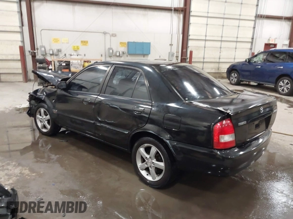 2003 Mazda Protege DX with VIN JM1BJ226431112902, listed as a IAAI auction lot 41939907 with 184,618 mi miles and . Bid and sale history available at DreamBid. Image 3.