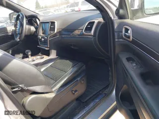 2014 Jeep Grand Cherokee Limited with VIN 1C4RJFBM7EC407052, listed as a IAAI auction lot 41699853 with 97381 miles. Bid and sale history available at carsss.com. Image 5.