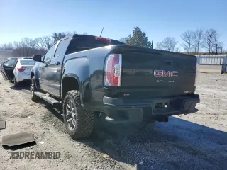 2021 GMC Canyon 4WD AT4 w/Leather with VIN 1GTG6FEN4M1155641, listed as a Copart auction lot 86793644 with 36,940 mi miles and Salvage Title. Bid and sale history available at carsss.com. Image 2.