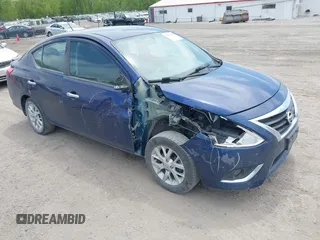 2019 Nissan Versa SV z VIN 3N1CN7AP7KL809443, wystawiony jako IAAI lot #42216308 z przebiegiem 101 860 mil mil oraz . Historia ofert i sprzedaży dostępna na DreamBid. Obrazek 1.