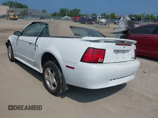 2003 Ford Mustang Deluxe z VIN 1FAFP444X3F378411, wystawiony jako IAAI lot #42682826 z przebiegiem 162 271 mil mil oraz . Historia ofert i sprzedaży dostępna na DreamBid. Obrazek 3.