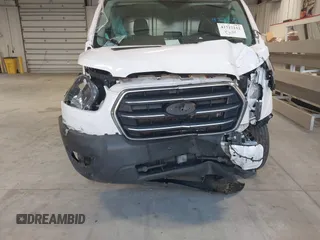 2020 Ford Transit Cargo with VIN 1FTBR1Y81LKA19650, listed as a IAAI auction lot 42727232 with 103,676 mi miles and . Bid and sale history available at DreamBid. Image 6.
