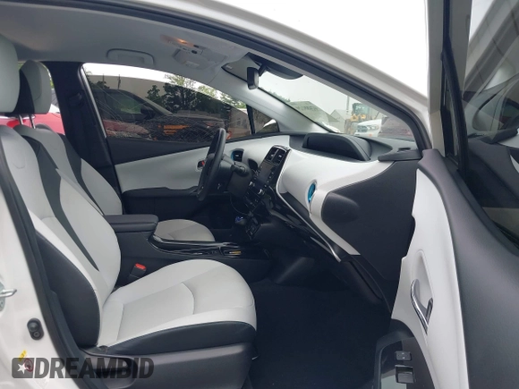 2021 Toyota Prius L Eco with VIN JTDKAMFU6M3137679, listed as a IAAI auction lot 42488129 with 52,414 mi miles and . Bid and sale history available at DreamBid. Image 5.
