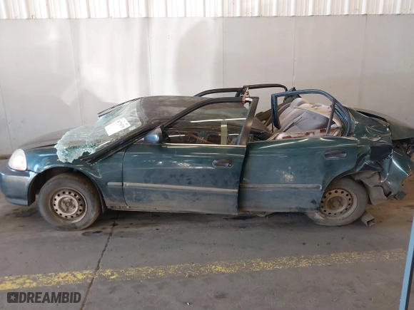 1996 Honda Civic DX with VIN 1HGEJ6625TL019386, listed as a IAAI auction lot 40775179 with 212,267 mi miles. Bid and sale history available at carsss.com. Image 15.
