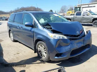 2013 Toyota Sienna XLE AAS with VIN 5TDYK3DC0DS398381, listed as a IAAI auction lot 41773688 with 169,055 mi miles. Bid and sale history available at carsss.com. Image 1.