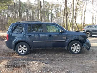 2009 Honda Pilot Touring with VIN 5FNYF48939B007471, listed as a IAAI auction lot 41683495 with 189,806 mi miles and . Bid and sale history available at carsss.com. Image 13.