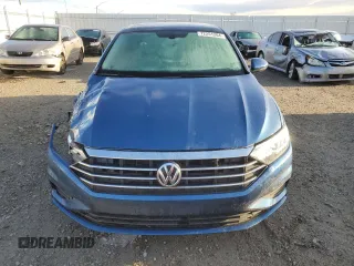 2021 Volkswagen Jetta SEL z VIN 3VWE57BUXMM015072, wystawiony jako Copart lot #72251204 z przebiegiem 126 772 mil mil oraz Szkoda całkowita • Salvage title. Historia ofert i sprzedaży dostępna na DreamBid. Obrazek 5.