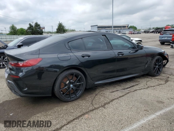 2022 BMW 8 Series M850i z VIN WBAGV8C02NCK08667, wystawiony jako Copart lot #55632805 z przebiegiem 22 737 mil mil oraz Szkody całkowita. Historia ofert i sprzedaży dostępna na DreamBid. Obrazek 3.