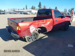 2003 Toyota Tacoma with VIN 5TENL42N33Z214188, listed as a IAAI auction lot 41435096 with 297,842 mi miles and . Bid and sale history available at DreamBid. Image 4.