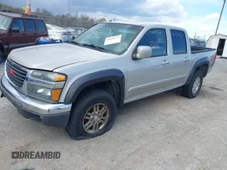 2009 GMC Canyon SLE1 z VIN 1GTDT13E398100890, wystawiony jako IAAI lot #42030572 z przebiegiem 160 181 mil mil oraz . Historia ofert i sprzedaży dostępna na DreamBid. Obrazek 2.